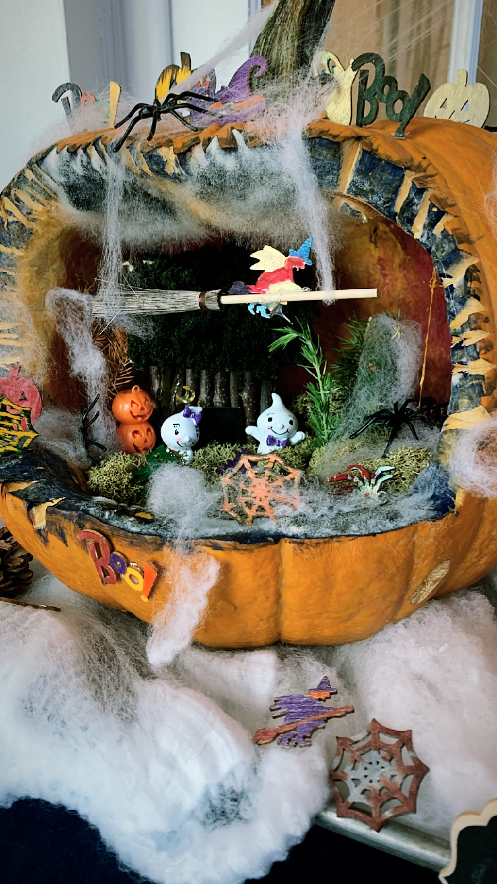 pumpkin with haunted scene inside 